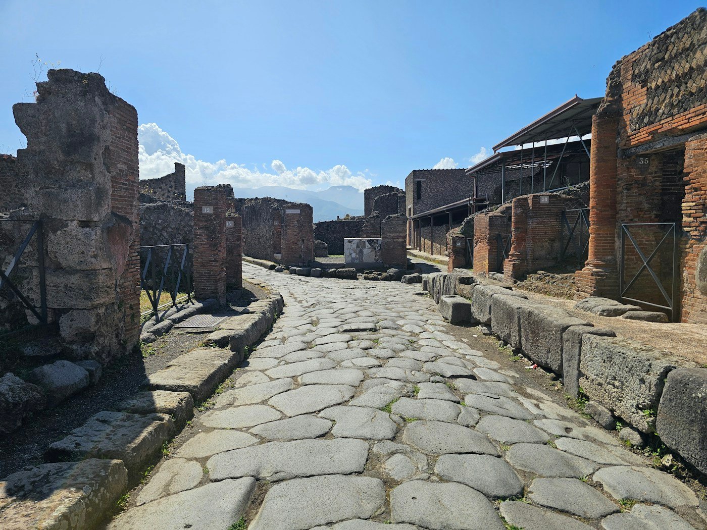 Pompeii ruins with Mount Vesuvius in the background for a late-summer planning guide
